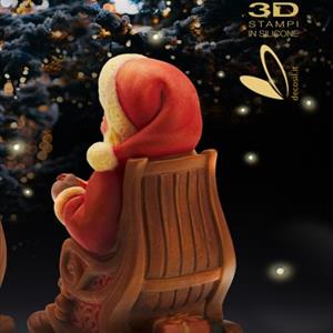 Père Noël sur chaise à bascule