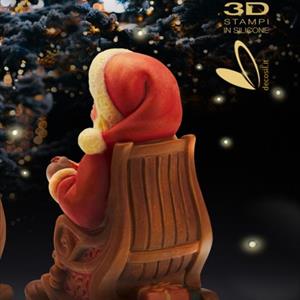 Père Noël sur chaise à bascule